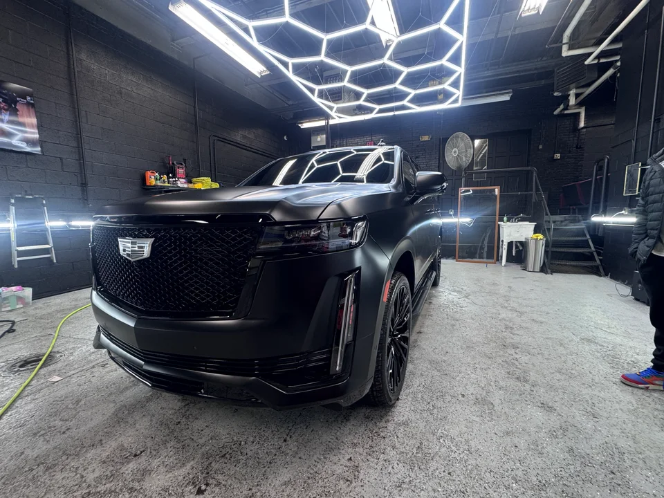 Black SUV inside the Detail Dash shop